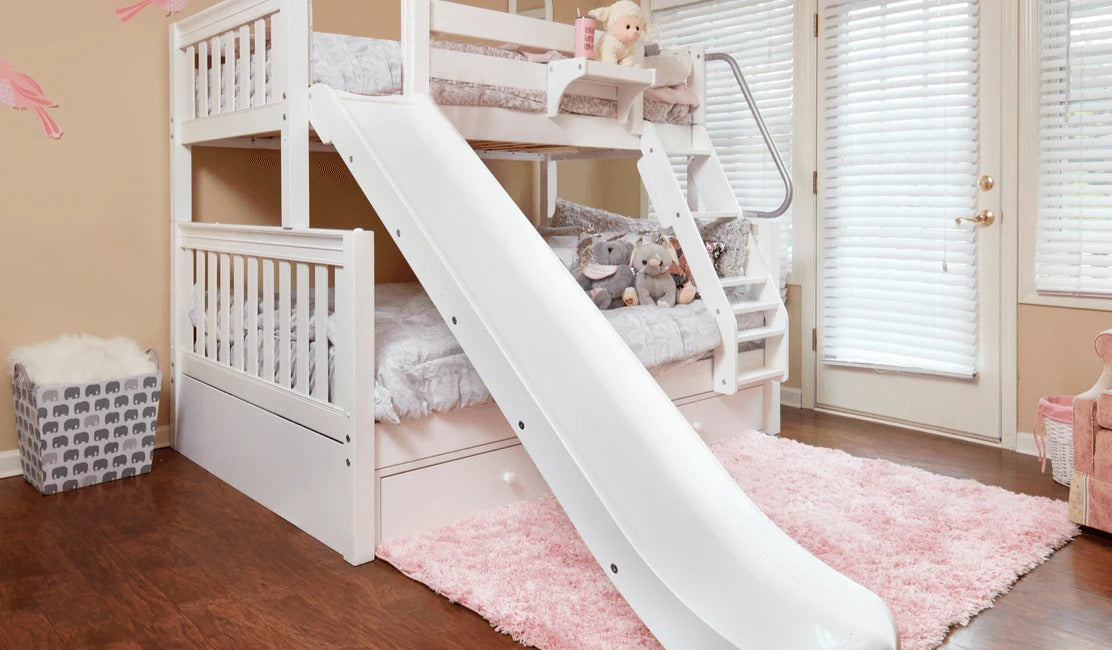 Kids bed with a slide in a bedroom.