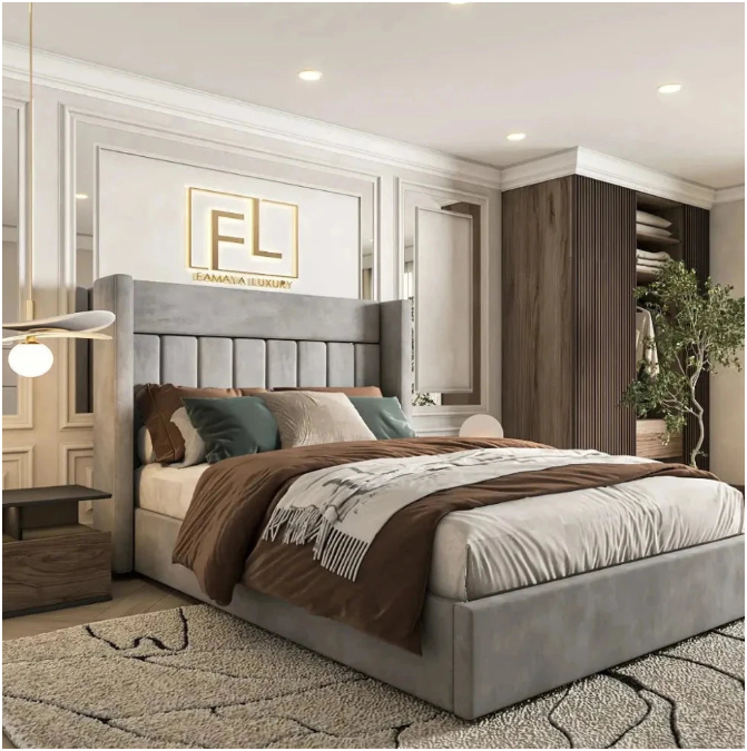 The image features a bedroom with a stylish velvet bed frame, complemented by a plant for added aesthetic appeal.