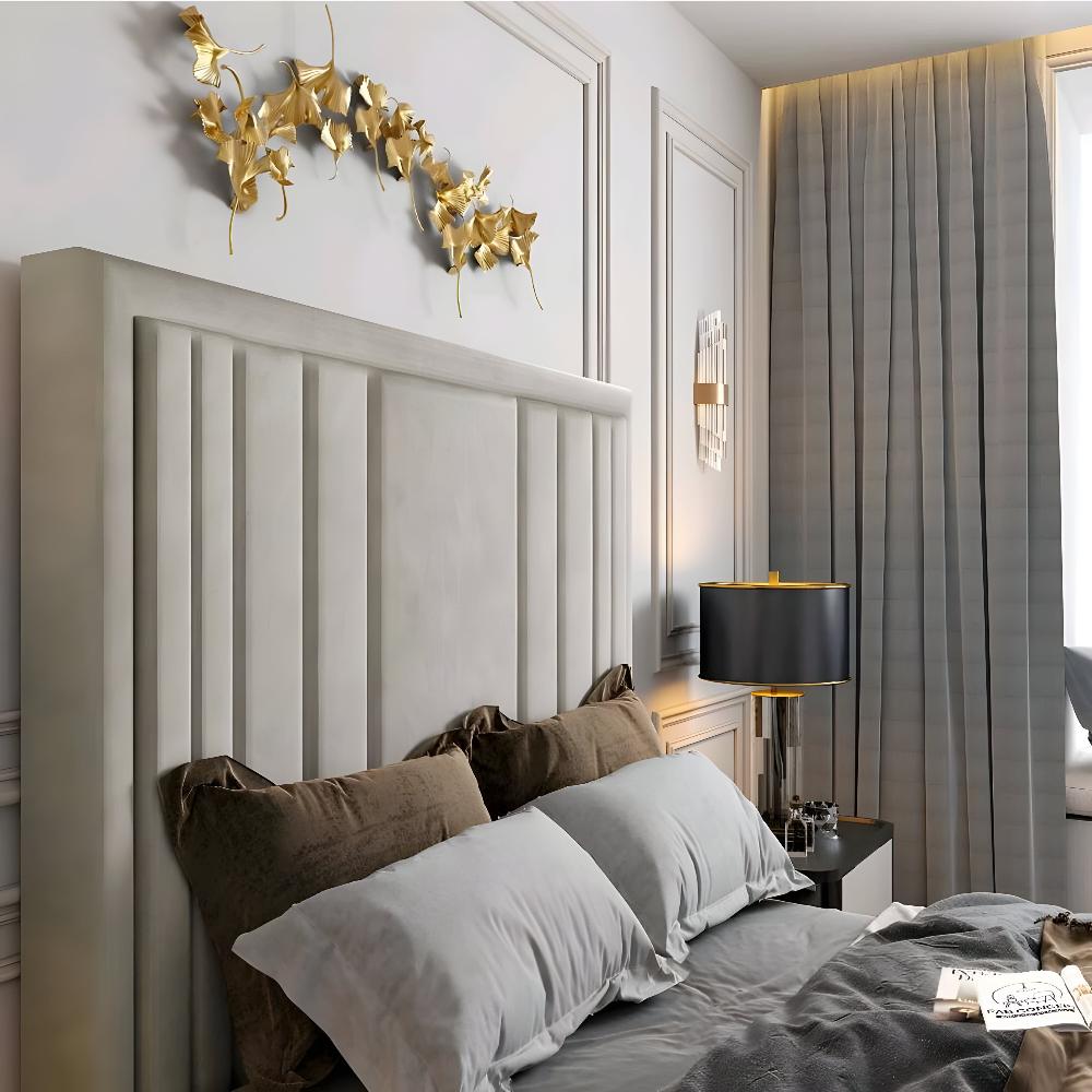 Modern bedroom with a light gray upholstered Alexander tv bed and gold leaf wall art.