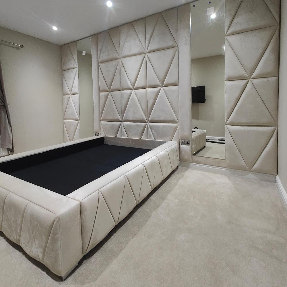 Modern master bedroom with a Luxury Geometric Wall Panel Bed Frame and custom padded geometric wall panels.