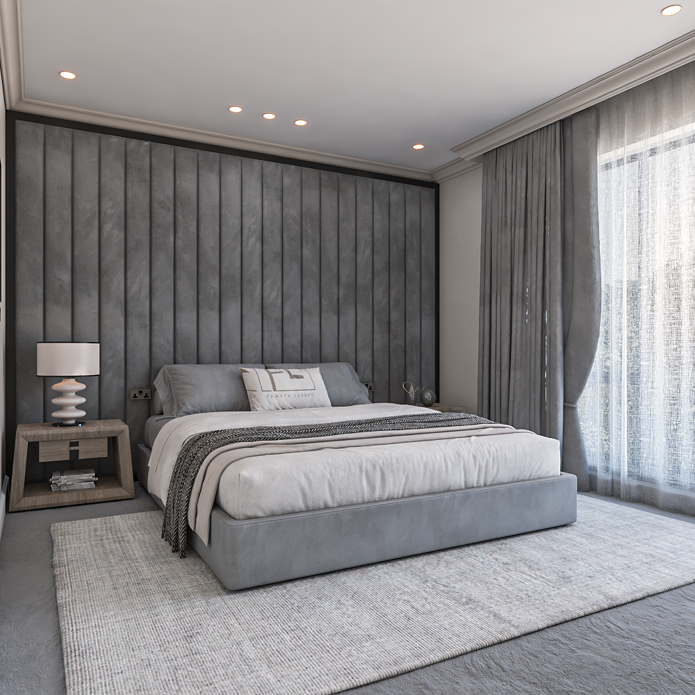 The Stella Wall Panel Bed Frame is large and has a simple design, featuring gray bedding and pillows.