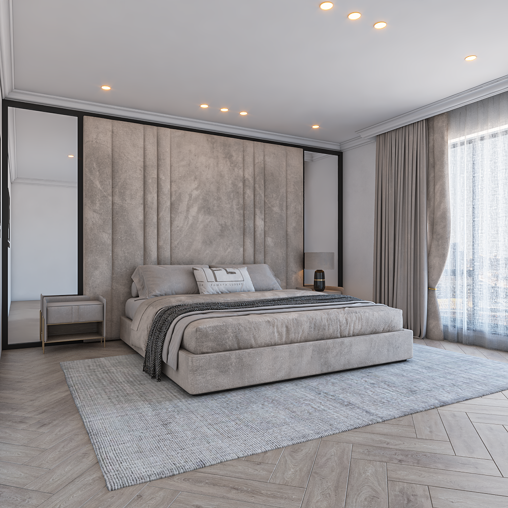 Modern bedroom with a large upholstered Alexander low base wall panel panel bed frame, bedside tables, a rug, and sheer curtains.