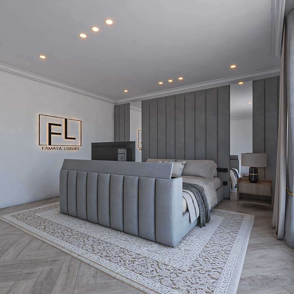 Modern bedroom with an Amaya wall panel TV footend bed featuring an upholstered footend with a TV, and "Famaya Luxury" logo on the wall.