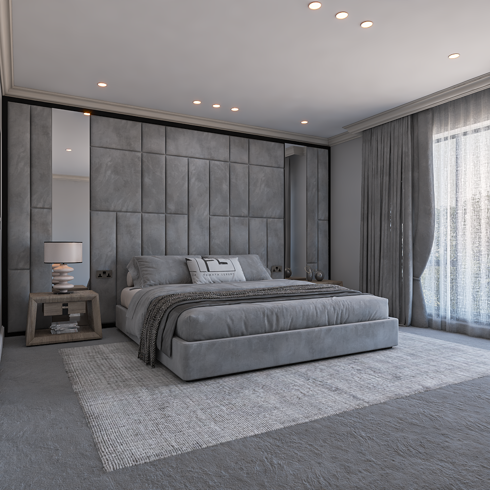 Modern bedroom with a large gray the atlantis bed, gray panel wall, bedside table with a lamp, light gray carpet, and sheer curtains.