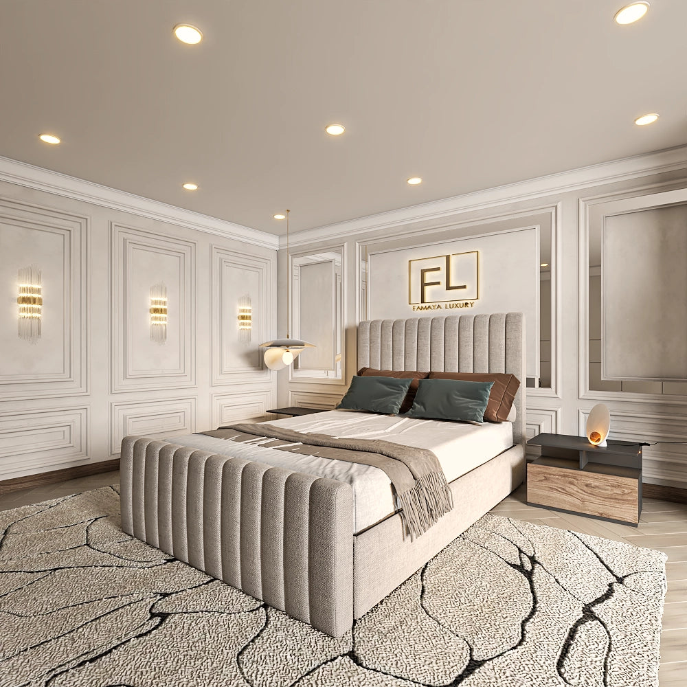The Lumiere Lined Bed Frame is a luxe room with beige bedding, gold accents, and an "FL" logo.