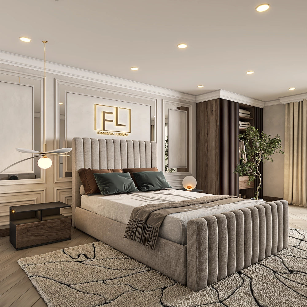 The Lumiere Lined Bed Frame is a luxe room with tufted bedding, and a gold "FL" logo.