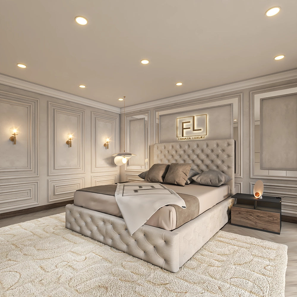 A luxurious bedroom with a tufted beige bed, soft pillows, gold "FL" logo, and elegant decor.