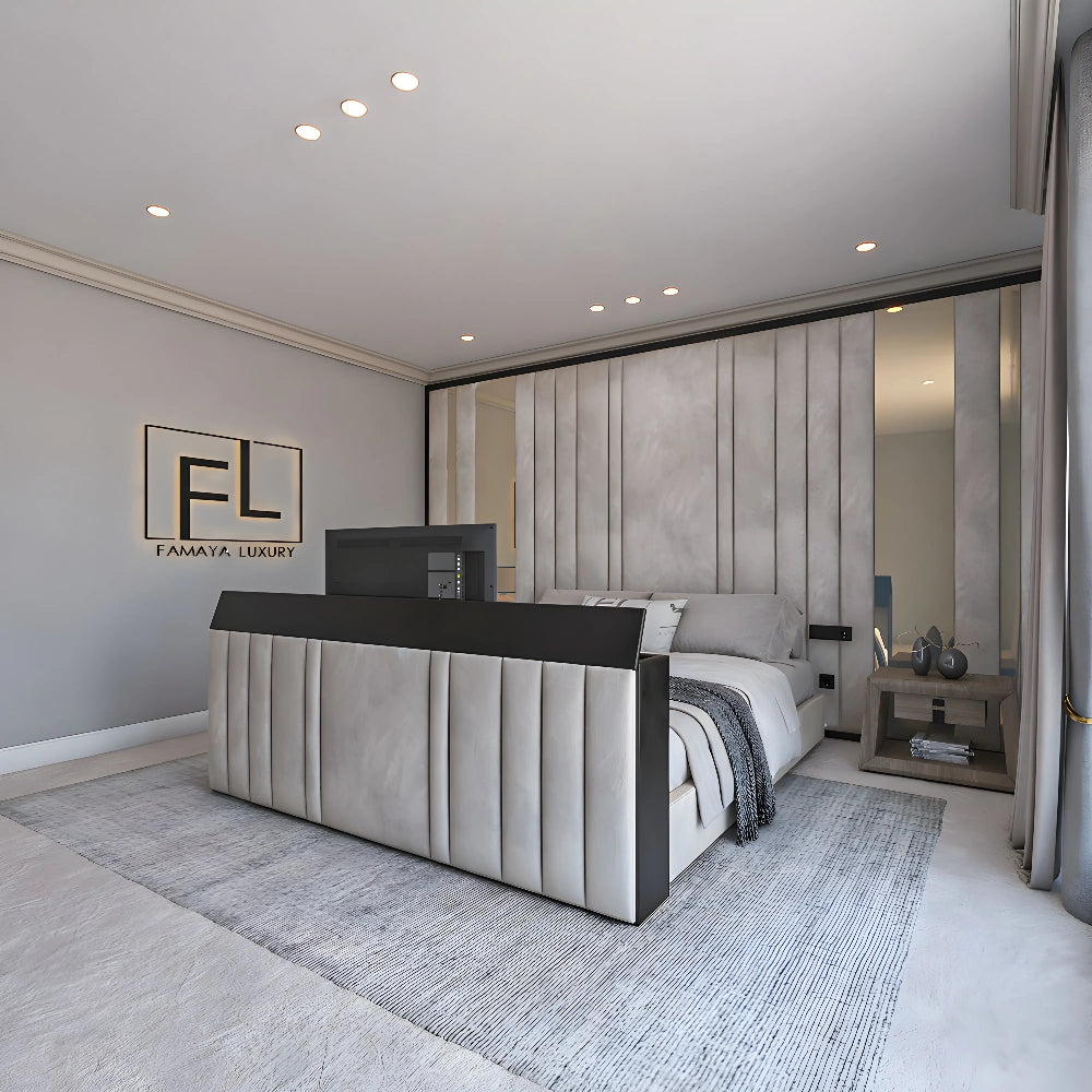 Modern bedroom with a gray, upholstered bed and vertical panel wall. Ceiling lights and logo "FL, FAMAYA LUXURY" visible.