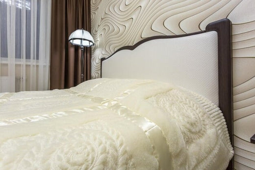 Crushed Velvet Single Bed with cream floral bedspread and padded headboard in a modern bedroom.