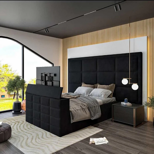 Modern bedroom with king-size bed with TV in the footboard.